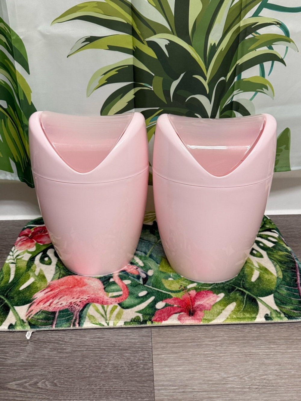 Pair of Pink Plastic Swing-Top Trash Bins